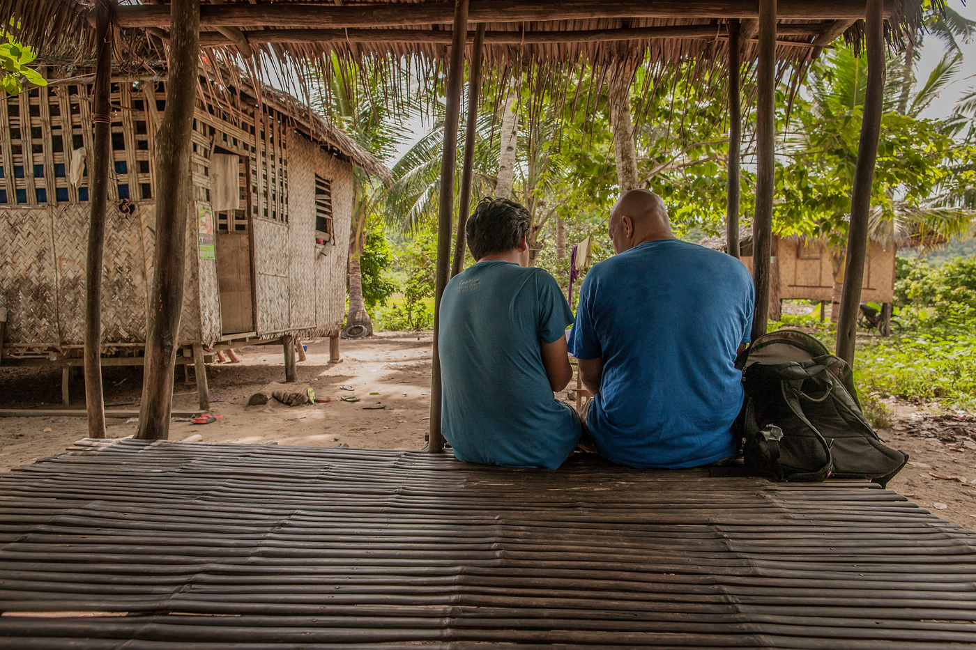 missionary and Filipino friend talking