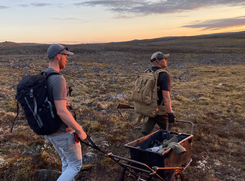 hunting caribou on the Canadian tundra