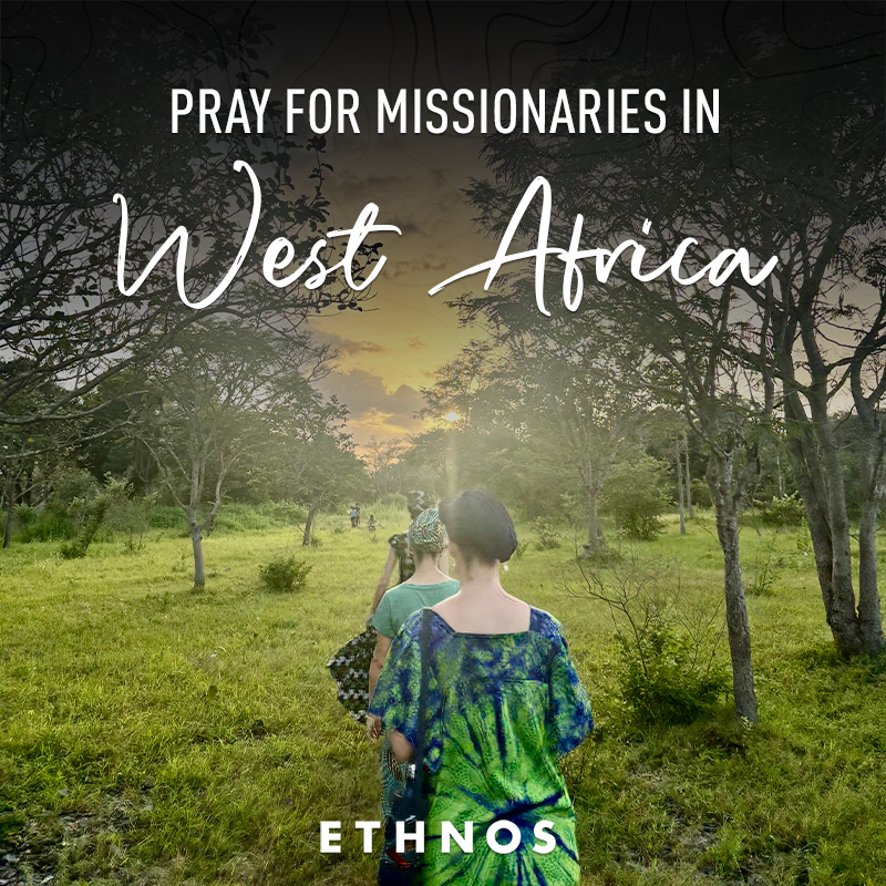 A group of ladies walking to a remote village to learn the culture